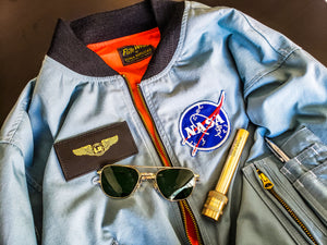Apollo Flight Jacket and Leather Nametags, as well as NASA Styled Sunglasses, Flashlights, Pens, etc.